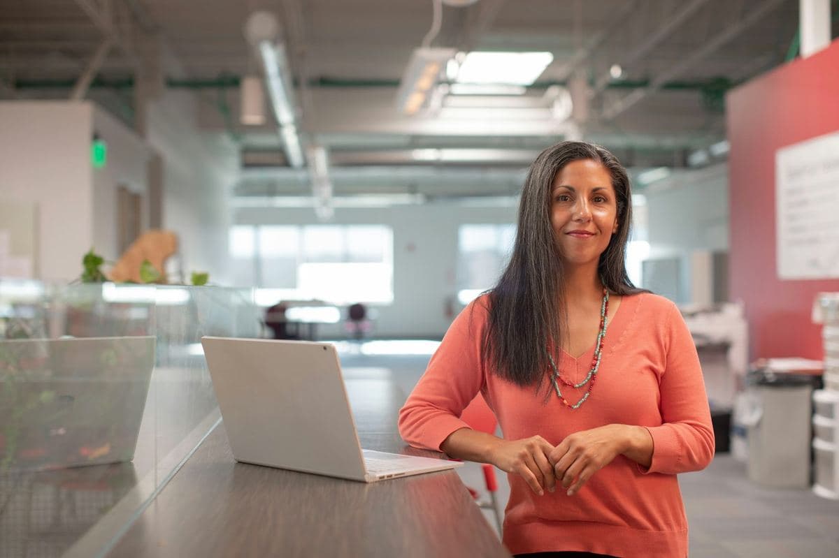 Standing up from a desk chair to start a walking break